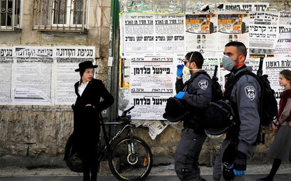 Israel cấm toàn dân di chuyển quá 100m từ cửa nhà-1