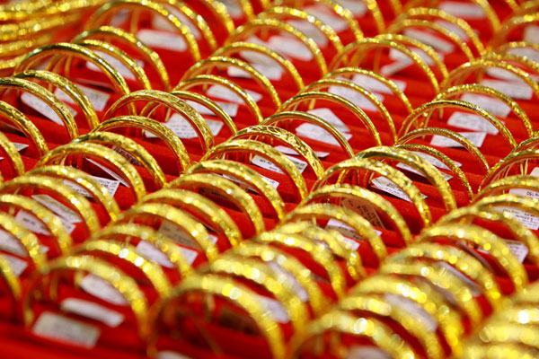 Giá vàng hôm nay 28/3: Cuộc đua bung tiền, vàng chứng tỏ giá trị-2