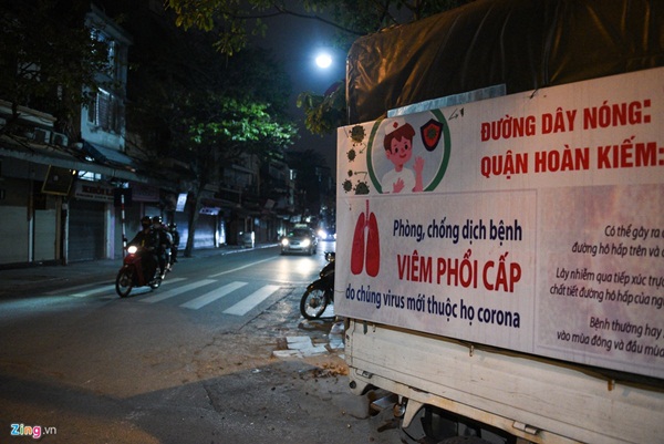 Phố phường ở TP.HCM và Hà Nội vắng vẻ sau 19h-16