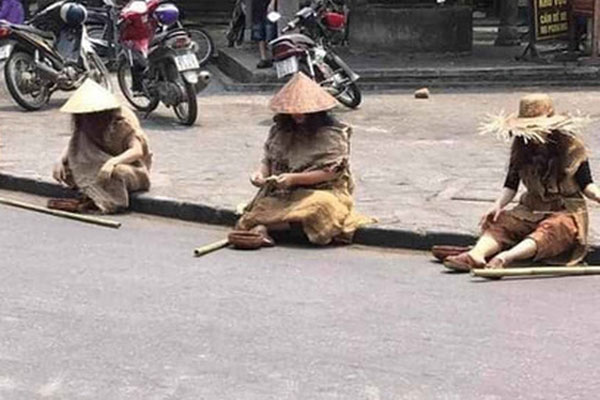 TP. HCM: Phát hiện cụ ông ăn xin có 12 giấy CMND và 54 triệu đồng-2