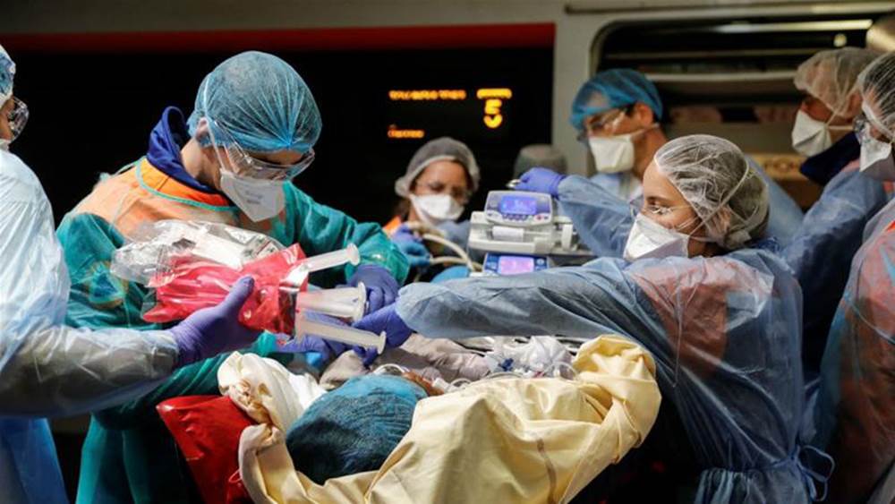 Đại dịch Covid-19 ngày càng tệ hơn, Mỹ chuẩn bị sẵn 100.000 túi đựng thi thể cho tình huống xấu nhất-1