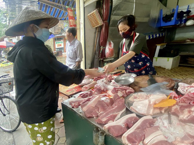 Lợn hơi tăng phi mã, 200.000 đồng chưa mua được 1kg thịt lợn-1