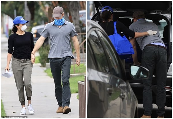 Meghan Markle bị soi cố tình diễn trước ống kính khi thân mật với chồng ở Mỹ và lộ chi tiết mất điểm-1