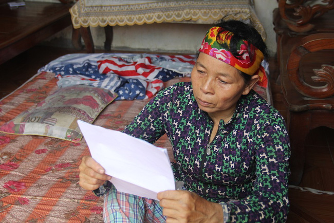 Góa phụ đội đơn tìm công lý cho con gái tật nguyền bị hàng xóm hiếp dâm-2