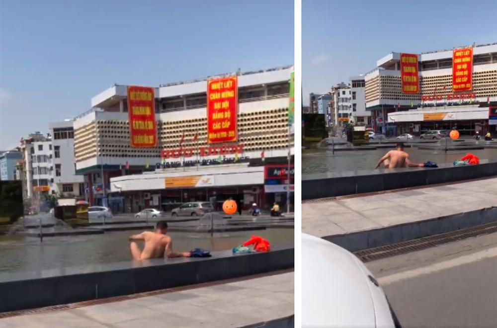 Người đàn ông thản nhiên thả rông ngồi nghịch nước dưới chân cột đồng hồ 35 tỷ giữa trung tâm TP Hạ Long-1