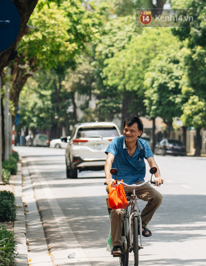 Ảnh: Nhiệt độ ngoài đường tại Hà Nội lên tới 50 độ C, người dân trùm khăn áo kín mít di chuyển trên phố-7