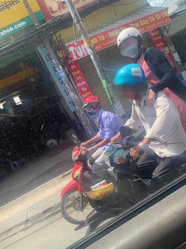 Đi xe máy dưới trời nắng cháy da, người phụ nữ có dáng ngồi khiến tất cả đều ngoái nhìn khó hiểu-3