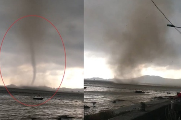 Lốc xoáy thổi bay mái nhà, suýt rơi trúng người đi đường-1