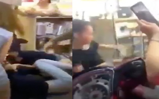 Xôn xao đoạn clip vợ chồng lao vào đánh nữ nhân viên tới tấp, đánh luôn người can ngăn-1