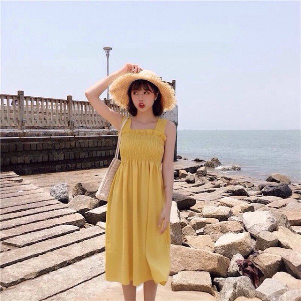 Kiểu váy liền được Hà Hồ ưu ái, mặc đi du lịch biển vừa đẹp lại khỏi lo đen da-13