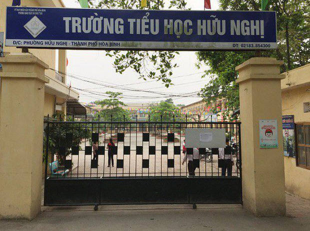 Vợ của người đàn ông hành hung bé trai lớp 1 để trả thù” cho con: Chồng tôi chỉ tát cháu sưng mồm thôi, cái gì cũng phải rõ trắng đen-1
