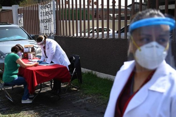 WHO xác nhận tình trạng khẩn cấp y tế nghiêm trọng nhất khi làn sóng Covid-19 tái phát mạnh ở nhiều nước-1