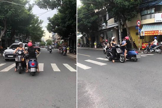 2 người phụ nữ dừng xe giữa ngã tư buôn chuyện mãi không dứt khiến ai qua cũng thở dài