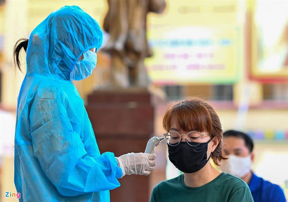 Hà Nội tái xét nghiệm người từ vùng dịch về bằng phương pháp rRT-PCR-4