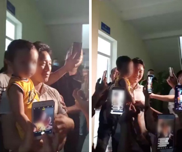 Gia đình cùng hàng trăm người dân đến trụ sở công an đón bé trai 2 tuổi ở Bắc Ninh, tặng hoa và chúc mừng rộn ràng như đêm Giao thừa-2
