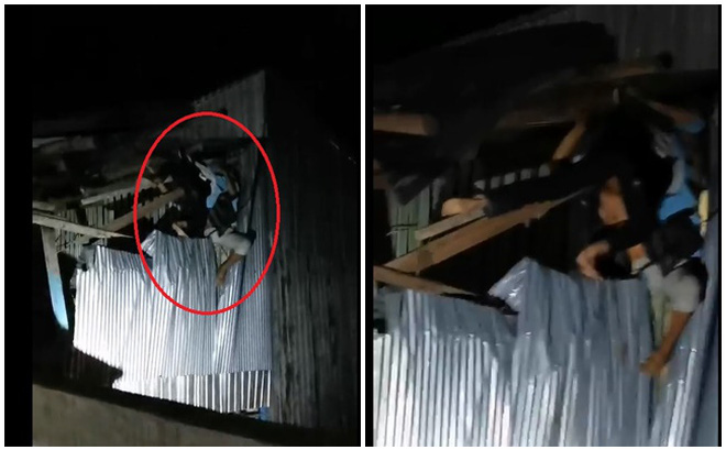 Hiện trường tai nạn đáng sợ: 2 thanh niên chạy xe máy, bay lên nóc nhà bên đường, mắc kẹt-1