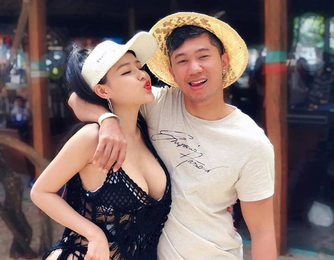 Ngân 98 đăng hình chụp thân mật với Quang Lê nhưng bàn tay của nam ca sĩ đặt ở vị trí nhạy cảm gây tranh cãi-2