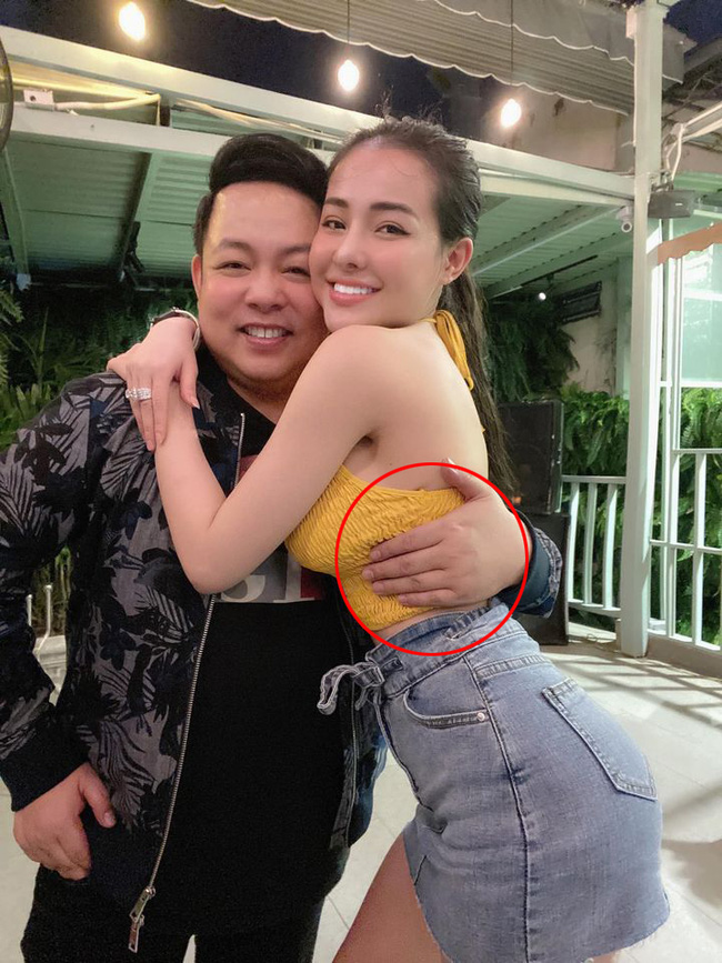 Ngân 98 đăng hình chụp thân mật với Quang Lê nhưng bàn tay của nam ca sĩ đặt ở vị trí nhạy cảm gây tranh cãi-1