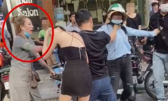 Bà mẹ 3 con với thâm niên 7 năm học võ vô tình nổi tiếng nhờ pha đánh ghen hộ trên phố Lý Nam Đế: Về nhà mới thấy tiếc vì mặc váy!-2