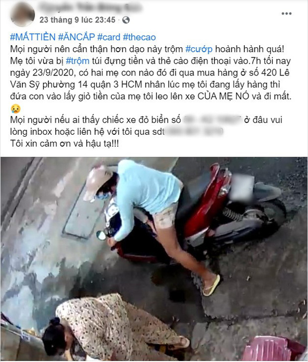 Clip: Giả vờ dừng xe mua hàng, người phụ nữ để con nhỏ lao vào lấy trộm túi tiền và thẻ cào điện thoại của bà cụ rồi đi thẳng-1