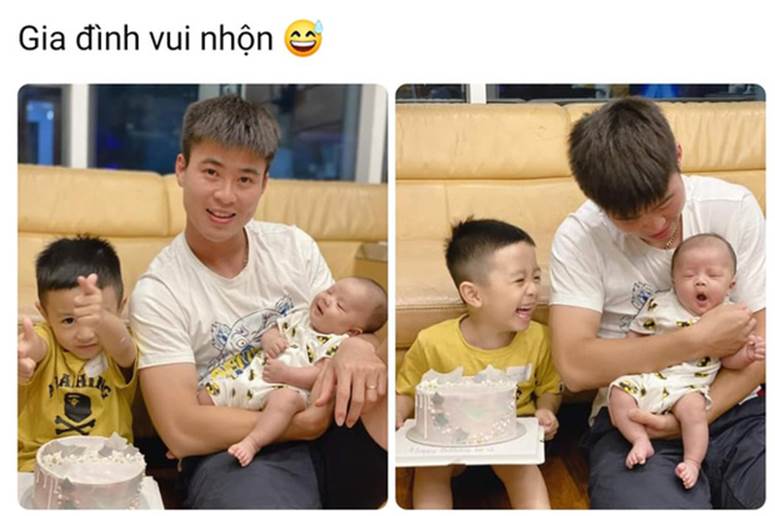 Hình ảnh đáng yêu: Duy Mạnh vừa bế con vừa cổ vũ Hà Nội FC, bé Ú nhoẻn miệng cười trong vòng tay bố-2