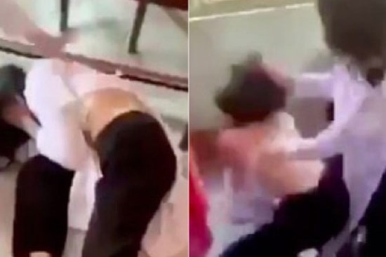 Nữ sinh lớp 9 bị đánh hội đồng, xé áo trước cổng trường