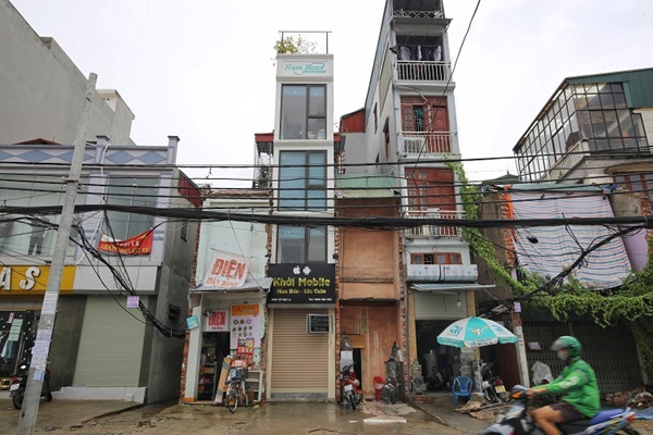 Kỳ lạ những căn nhà siêu nhỏ chỉ vừa một người đi nhưng giá hơn 400 triệu/m2 ở Hà Nội-2