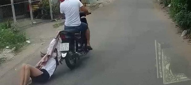 Clip tên cướp kéo lê cô gái hàng trăm mét trên đường phố Sài Gòn gây phẫn nộ-1