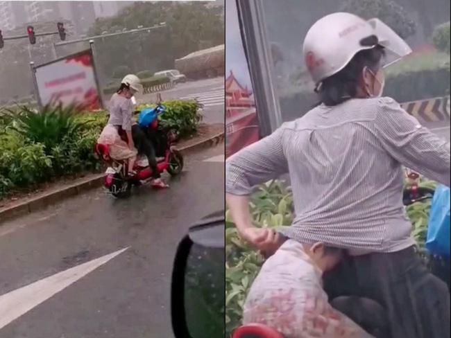 Đón con đi học về gặp trời mưa, người mẹ có hành động khiến ai nhìn cũng xúc động vì thấy cả tuổi thơ mình trong đó-1