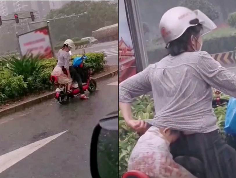 Em bé núp sau mẹ lưng như ninja trên đường phố, cảnh tượng vừa hài hước vừa cảm động vì manh áo mẹ luôn là tấm khiên bảo vệ an toàn nhất-2