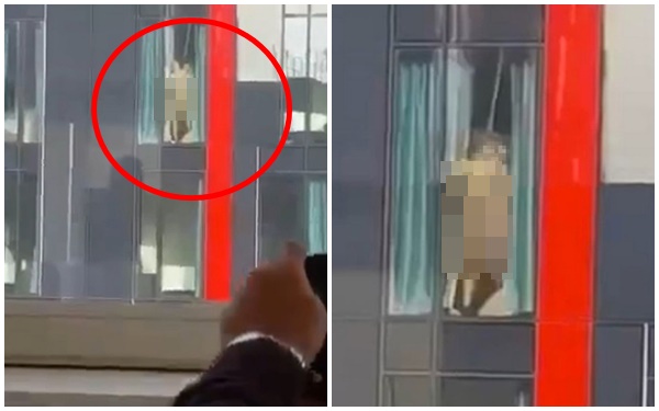 Đang làm việc trong văn phòng, người đàn ông nhìn ra ngoài cửa sổ và choáng váng với khoảnh khắc đỏ mặt ở tòa nhà đối diện-1