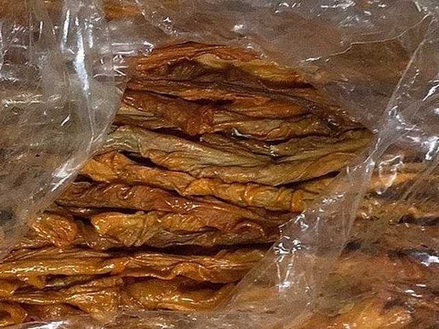 Nửa tấn lòng lợn sấy khô không nguồn gốc suýt lên bàn nhậu ở Hà Nội-1