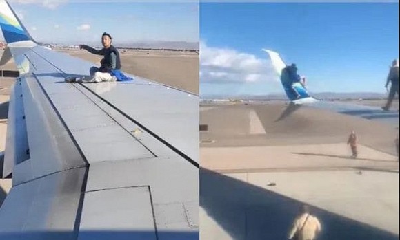 Khoảnh khắc người đàn ông trèo lên cánh máy bay khi chuẩn bị lăn bánh khiến người xem đứng hình-3