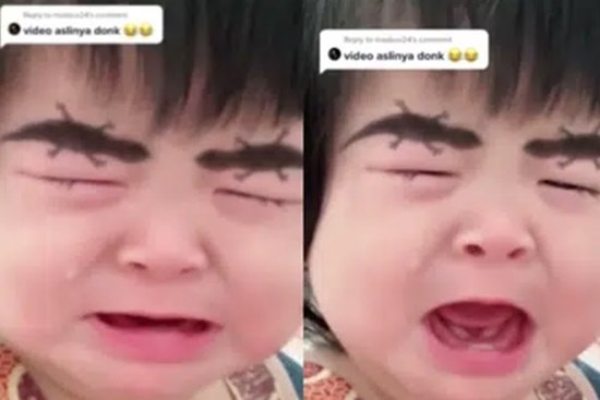 Được mẹ vẽ cho cặp lông mày 