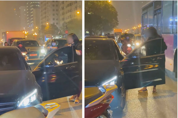 Người phụ nữ chặn xe Mercedes giữa đường phố Hà Nội nghi do bị bạn tốt cướp chồng, cú đá của cô gái trẻ từ ô tô gây chú ý-1