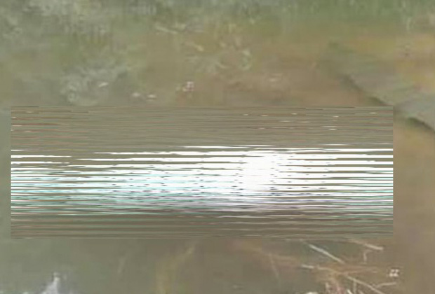 Phát hiện thi thể người phụ nữ quấn trong bao tải nổi trên mặt hồ-1