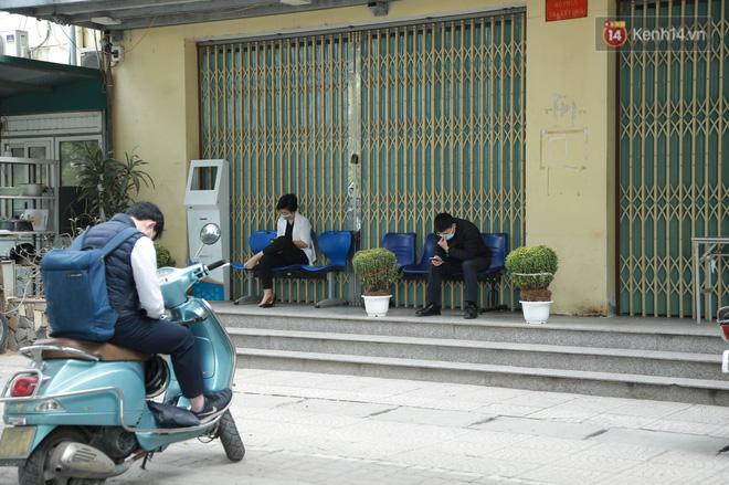 Có ca mắc Covid-19 ghé qua, VP Đăng ký đất đai Hà Nội phải tạm dừng hoạt động, tiến hành khử khuẩn-4