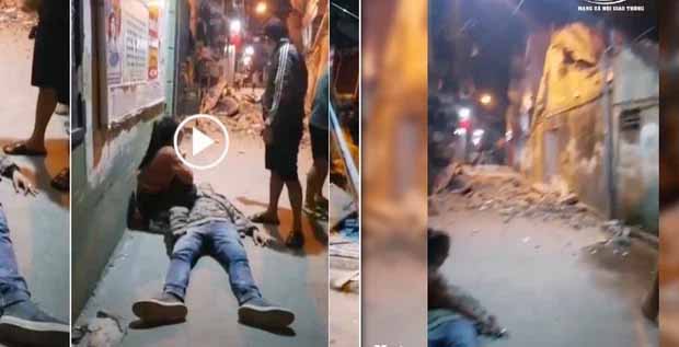 Hà Nội: Bức tường bất ngờ đổ sập khiến người đàn ông đi xe máy bất tỉnh, vợ mang bầu thoát nạn-1