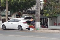 Xôn xao hình ảnh người phụ nữ dùng xe hơi đi bán cam lề đường: Câu chuyện phía sau gây tò mò