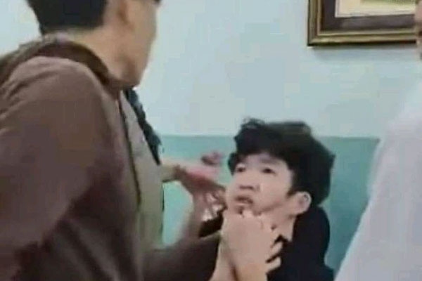 Bảo vệ dân phố tra tấn 2 thiếu niên trong trường THCS ở TP.HCM là ai?-5