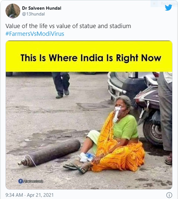 Xót xa bức ảnh cụ bà ngồi lả bên cạnh bình oxy giữa cơn bão Covid-19 càn quét Ấn Độ, câu chuyện phía sau khiến tất cả giật mình-4