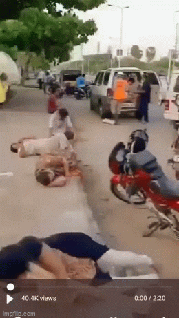Sự thật phía sau đoạn clip người dân Ấn Độ mắc Covid-19 ngã gục, nằm la liệt trên đường phố gây bão mạng xã hội-1