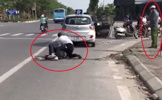 Đại úy công an giải trình thế nào về việc đứng bấm điện thoại, để tài xế taxi một mình vật lộn với tên cướp trốn truy nã?-2