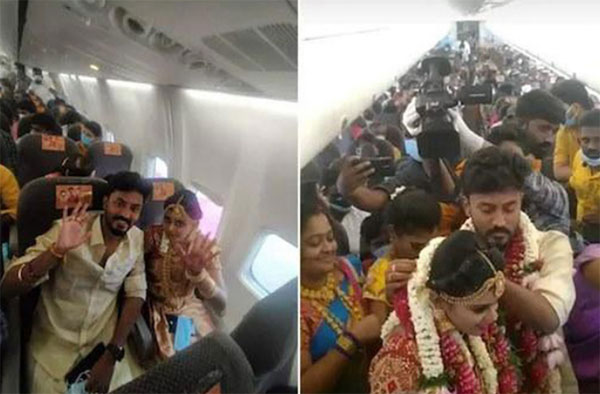 Video: Mặc lệnh cấm tụ tập, cô dâu chú rể Ấn Độ thuê máy bay riêng chở 161 người tổ chức đám cưới trên không-1