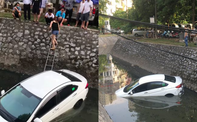 Nữ tài xế lao ô tô xuống mương nước đen ngòm, nhìn cảnh người dân vác thang xuống ứng cứu khiến người chứng kiến vừa thương vừa sợ-1