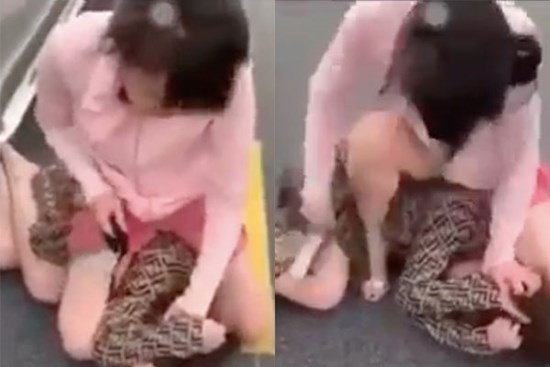Xôn xao clip đánh ghen kinh hoàng: Vợ đè 'tiểu tam' xuống đường, dùng guốc nhọn đánh liên tục vào người