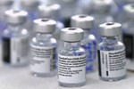 Mỹ bổ sung khuyến cáo về tác dụng phụ có thể xảy ra sau tiêm vaccine COVID-19-3