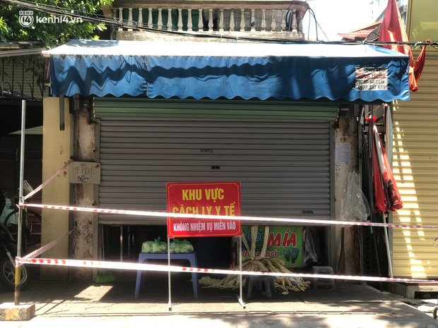 Ảnh: Hà Nội phong toả 3 toà nhà xung quanh một đại lý Vietlott và hàng loạt địa điểm khác liên quan các chùm ca bệnh-6