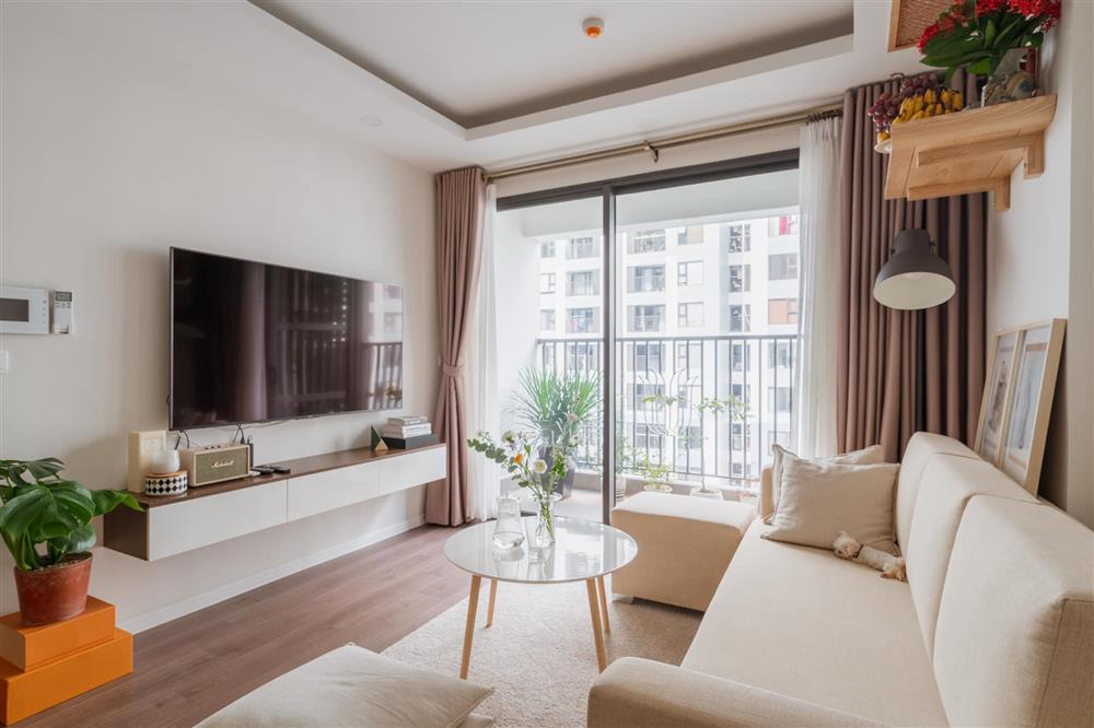 Căn hộ chung cư phong cách tối giản với tone màu trắng kem đầy ấn tượng, sạch sẽ tươm tất mà không kém phần sang chảnh-1