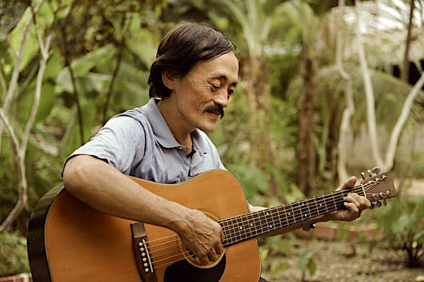 Con trai nghệ sĩ Giang còi: Ba tôi muốn được chôn cùng cây đàn guitar-1